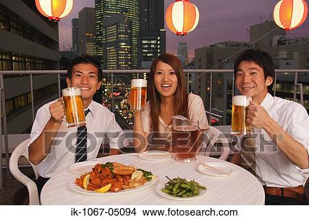 People Enjoying Beer and Snacks View Large Photo Image Picture - People Enjoying Beer and Snacks. Fotosearch
