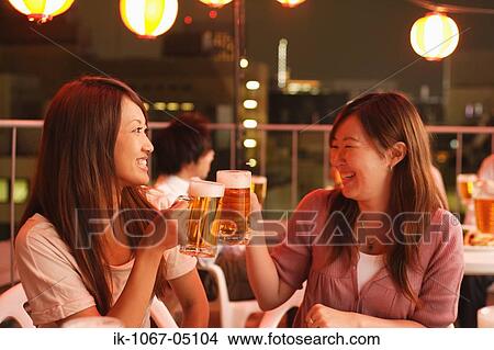 People Enjoying Beer and Snacks View Large Photo Image Picture - People Enjoying Beer and Snacks. Fotosearch