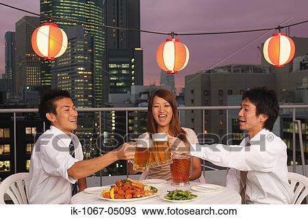 People Enjoying Beer and Snacks View Large Photo Image Stock Image - People Enjoying Beer and Snacks. Fotosearch