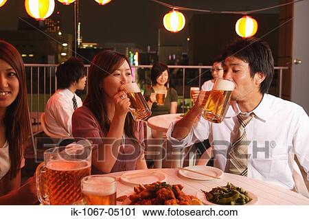 People Enjoying Beer and Snacks View Large Photo Image Stock Image - People Enjoying Beer and Snacks. Fotosearch
