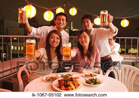 People Enjoying Beer and Snacks View Large Photo Image Stock Image - People Enjoying Beer and Snacks. Fotosearch