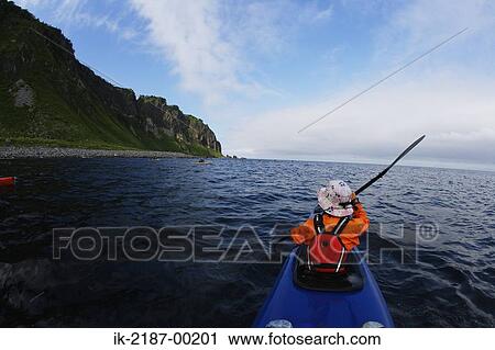 Stock Image - Person Boating on Kayak, Hokkaido, Japan . Fotosearch