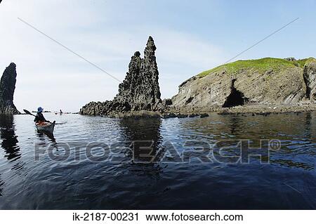 Stock Image - Person Boating on Kayak, Hokkaido, Japan . Fotosearch