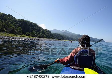 Stock Photo - Person Boating on Kayak, Hokkaido, Japan . Fotosearch