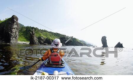 Person Boating on Kayak, Hokkaido, Japan View Large Photo Image Stock Photo - Person Boating on Kayak, Hokkaido, Japan . Fotosearch