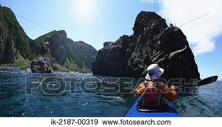 Person Boating on Kayak, Hokkaido, Japan View Large Photo Image Stock Photo - Person Boating on Kayak, Hokkaido, Japan . Fotosearch