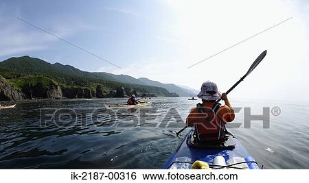 Person Boating on Kayak, Hokkaido, Japan View Large Photo Image Stock Photograph - Person Boating on Kayak, Hokkaido, Japan . Fotosearch