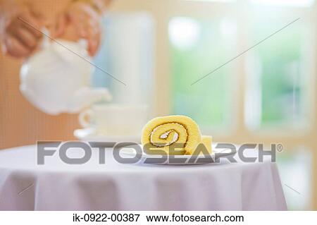 Person Serving Tea with Snacks View Large Photo Image Stock Photo - Person Serving Tea with Snacks. Fotosearch