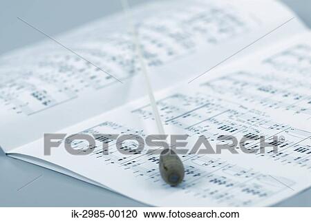 Printed Musical Score with Baton on White Paper View Large Photo Image Stock Image - Printed Musical Score with Baton on White Paper. Fotosearch