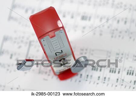 Printed Musical Score with Metronome on White Paper View Large Photo Image Stock Image - Printed Musical Score with Metronome on White Paper. Fotosearch