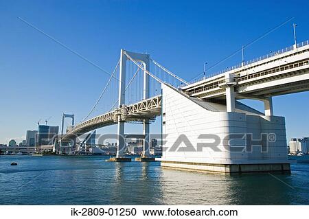 Stock Image - Rainbow Bridge in Tokyo, Japan. Fotosearch