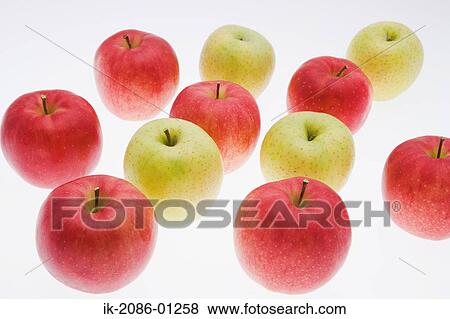 Red and Golden Apples on White Background View Large Photo Image Stock Photo - Red and Golden Apples on White Background. Fotosearch