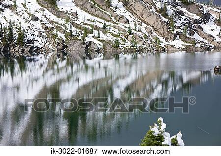 Reflection of Snow-Capped Mountains in Lake View Large Photo Image Stock Photo - Reflection of Snow-Capped Mountains in Lake. Fotosearch