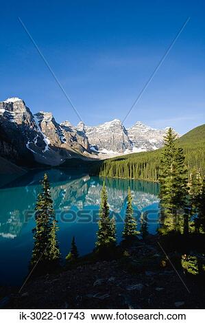 Reflection of Snow-Covered Mountains in Moraine Lake View Large Photo Image Stock Image - Reflection of Snow-Covered Mountains in Moraine Lake. Fotosearch
