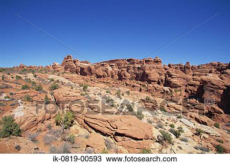 Stock Image - Rocky Rugged Mountains in Wilderness. Fotosearch