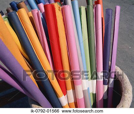 Stock Photograph - Rolls of Colourful Paper Stacked Together. Fotosearch
