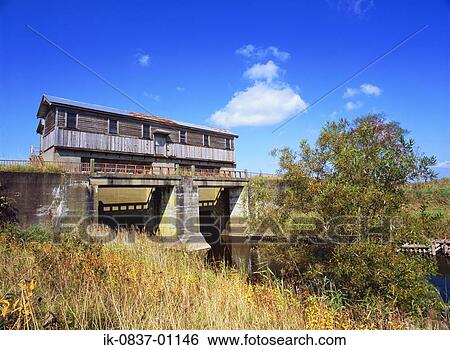 Rustic wooden house with bridge in countryside View Large Photo Image Stock Photograph - Rustic wooden house with bridge in countryside. Fotosearch