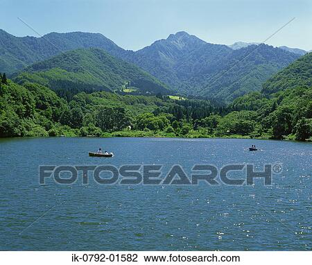 Stock Image - Scenic View of Boat in Lake, Niigata Prefecture, Japan. Fotosearch