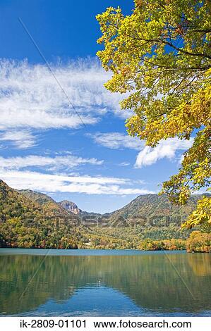 Stock Image - Scenic View of Mountain and Lake, Tochigi Prefecture, Japan. Fotosearch