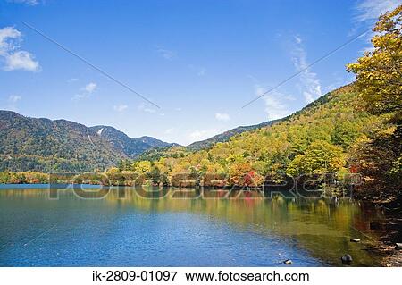 Stock Photo - Scenic View of Mountain and Lake, Tochigi Prefecture, Japan. Fotosearch