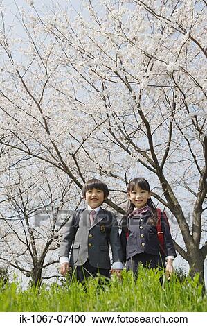 Schoolmate going to school and looking at camera View Large Photo Image Stock Image - Schoolmate going to school and looking at camera. Fotosearch