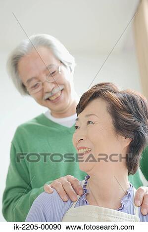 Senior Asian couple smiling together View Large Photo Image Stock Image - Senior Asian couple smiling together. Fotosearch