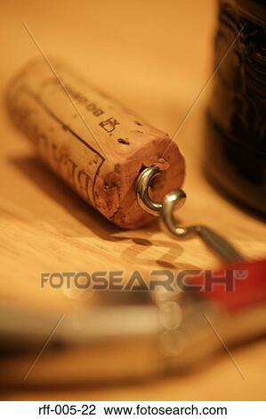 Stock Image - Shadows of Wine Bottles and Glasses of Wine. Fotosearch