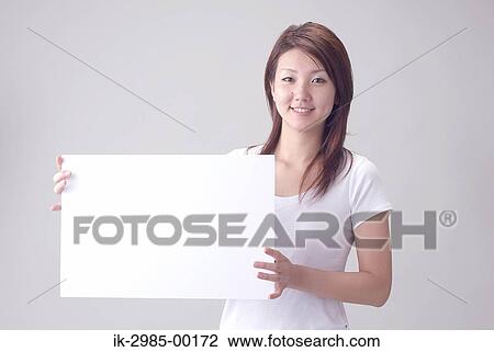 Smiling Japanese Woman with Whiteboard View Large Photo Image Stock Image - Smiling Japanese Woman with Whiteboard. Fotosearch