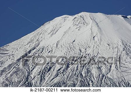 Stock Image - Snow Capped Mount Fuji . Fotosearch