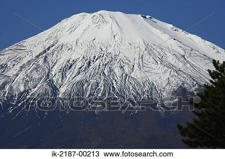Stock Image - Snow Capped Mount Fuji . Fotosearch