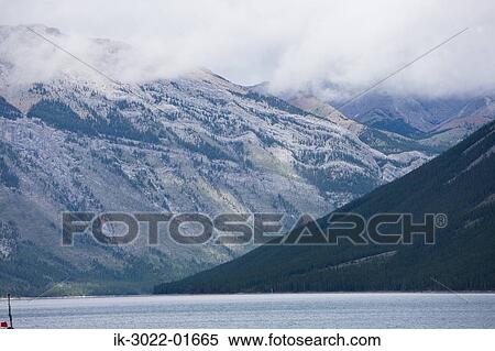 Snow-Capped Mountains in Banff, Canada View Large Photo Image Stock Photography - Snow-Capped Mountains in Banff, Canada. Fotosearch