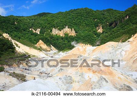 Snow-capped mountains with trees growing in wilderness View Large Photo Image Picture - Snow-capped mountains with trees growing in wilderness. Fotosearch