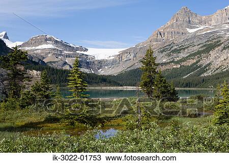 Stock Image - Snow-Covered Mountains Near Bow Lake in Canada. Fotosearch