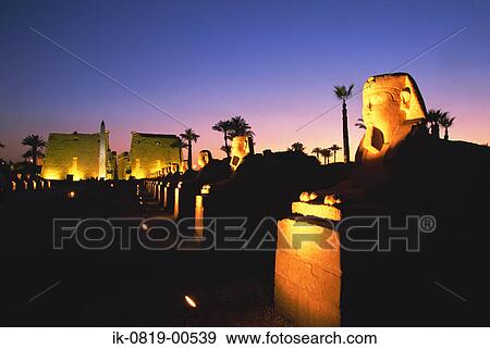 Statues and Obelisk at Temple of Luxor, Egypt View Large Photo Image Stock Photo - Statues and Obelisk at Temple of Luxor, Egypt. Fotosearch