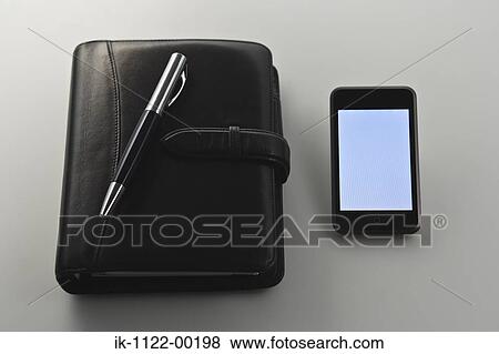 Still life of laptop, spectacles, pen, diary and stopwatch View Large Photo Image Stock Photo - Still life of laptop, spectacles, pen, diary and stopwatch. Fotosearch