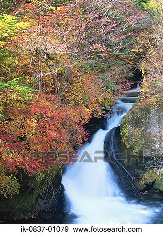 Stream of water cascading View Large Photo Image Stock Photo - Stream of water cascading . Fotosearch
