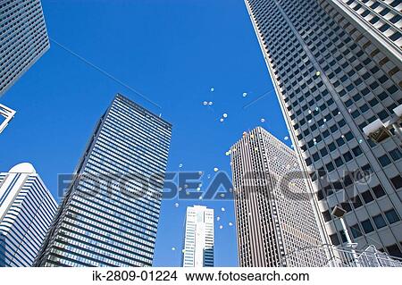 Street with Large Buildings in Tokyo, Japan View Large Photo Image Picture - Street with Large Buildings in Tokyo, Japan. Fotosearch