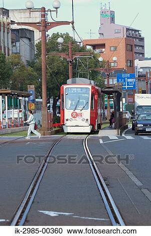 Streetcar on Tramway at Kyushu, Kagoshima Prefecture, Japan View Large Photo Image Stock Image - Streetcar on Tramway at Kyushu, Kagoshima Prefecture, Japan. Fotosearch