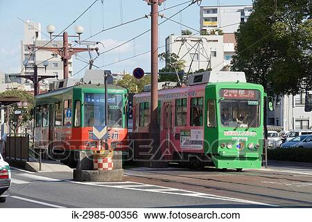 Stock Photograph - Streetcar on Tramway at Kyushu, Kagoshima Prefecture, Japan. Fotosearch