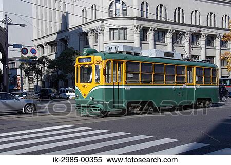Streetcar on Tramway at Kyushu, Kagoshima Prefecture, Japan View Large Photo Image Stock Photography - Streetcar on Tramway at Kyushu, Kagoshima Prefecture, Japan. Fotosearch