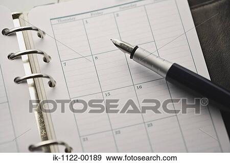 Stock Photo - Studio shot of a closed notebook. Fotosearch