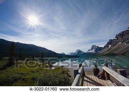 Sun Shining on Snow-Capped Mountains View Large Photo Image Stock Image - Sun Shining on Snow-Capped Mountains. Fotosearch