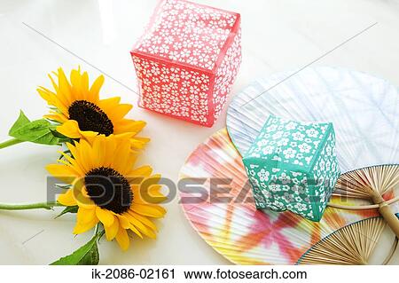 Sunflowers, gift boxes and bamboo fans View Large Photo Image Stock Image - Sunflowers, gift boxes and bamboo fans. Fotosearch