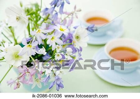 Stock Photograph - Teacup and Flowers. Fotosearch