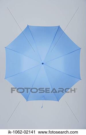 Top of blue umbrella View Large Photo Image Stock Image - Top of blue umbrella. Fotosearch