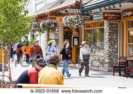Tourist Walking in Banff, Alberta, Canada View Large Photo Image Stock Photo - Tourist Walking in Banff, Alberta, Canada. Fotosearch