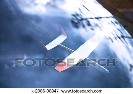 Stock Photo - Toy Airplane in the Car. Fotosearch
