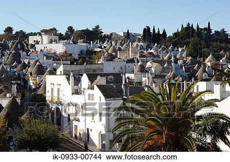 Trulli Limestone Houses in Alberobello. Puglia, Italy View Large Photo Image Picture - Trulli Limestone Houses in Alberobello. Puglia, Italy. Fotosearch