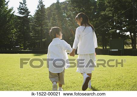 Two Children Walking Together View Large Photo Image Stock Image - Two Children Walking Together. Fotosearch