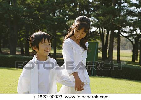 Two Children Walking Together View Large Photo Image Stock Image - Two Children Walking Together. Fotosearch